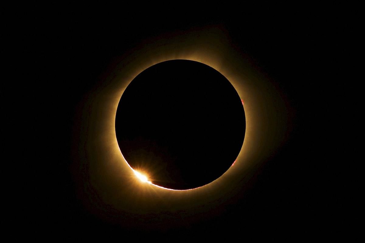 burning halo: A total solar eclipse visible from Farmington, Missouri in 2017. A similar total solar eclipse on May 29, 1919, made Einstein a celebrity scientist. PTI