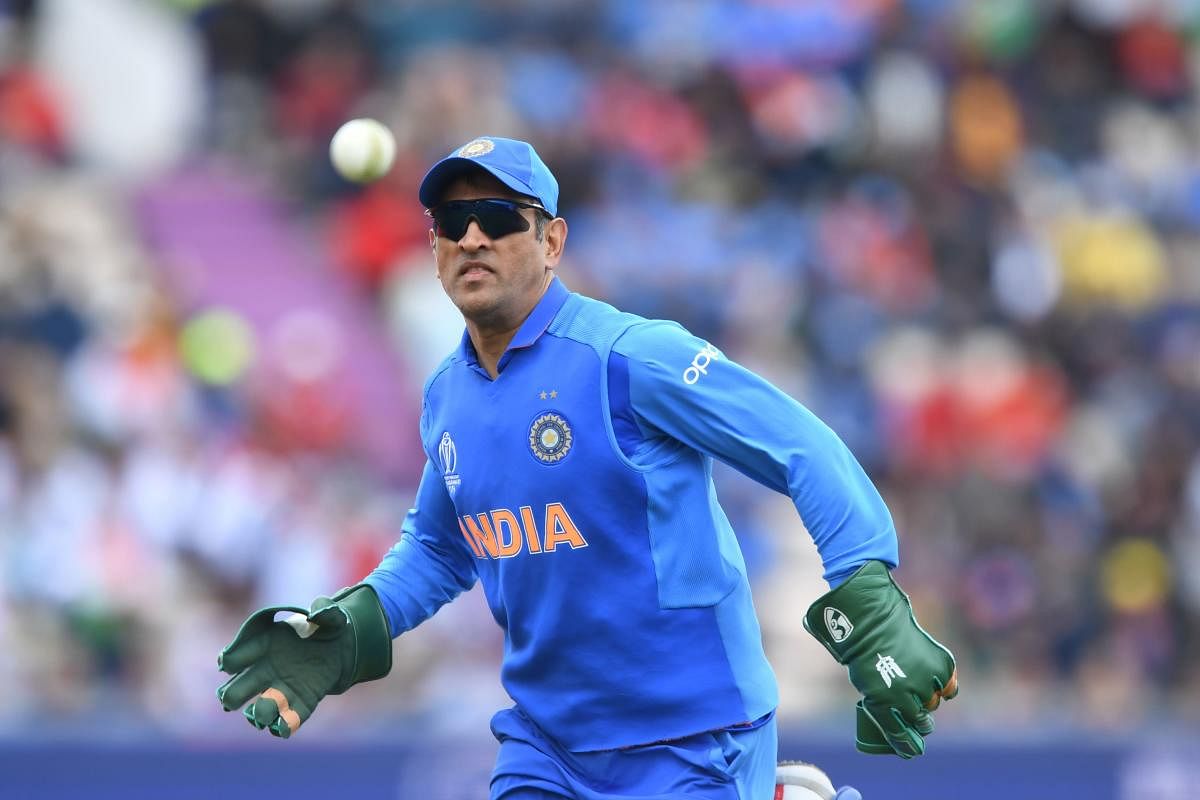 IN A SPOT MS Dhoni’s decision to sport the ‘Balidaan’ insignia on his gloves generated plenty of heat. AFP