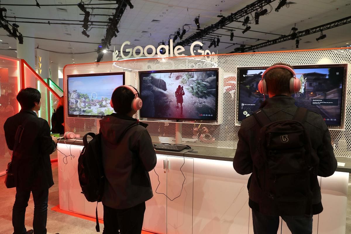 In this file photo taken on March 20, 2019 attendees play games on the new Stadia gaming platform at the Google booth at the 2019 GDC Game Developers Conference in San Francisco, California. (JUSTIN SULLIVAN / GETTY IMAGES NORTH AMERICA / AFP)