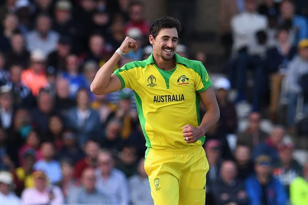 Australia's Mitchell Starc celebrates after taking his fifth wicket, that of West Indies' Sheldon Cottrell during the 2019 Cricket World Cup group stage match between Australia and West Indies at Trent Bridge in Nottingham, central England, on June 6, 2019. (AFP)