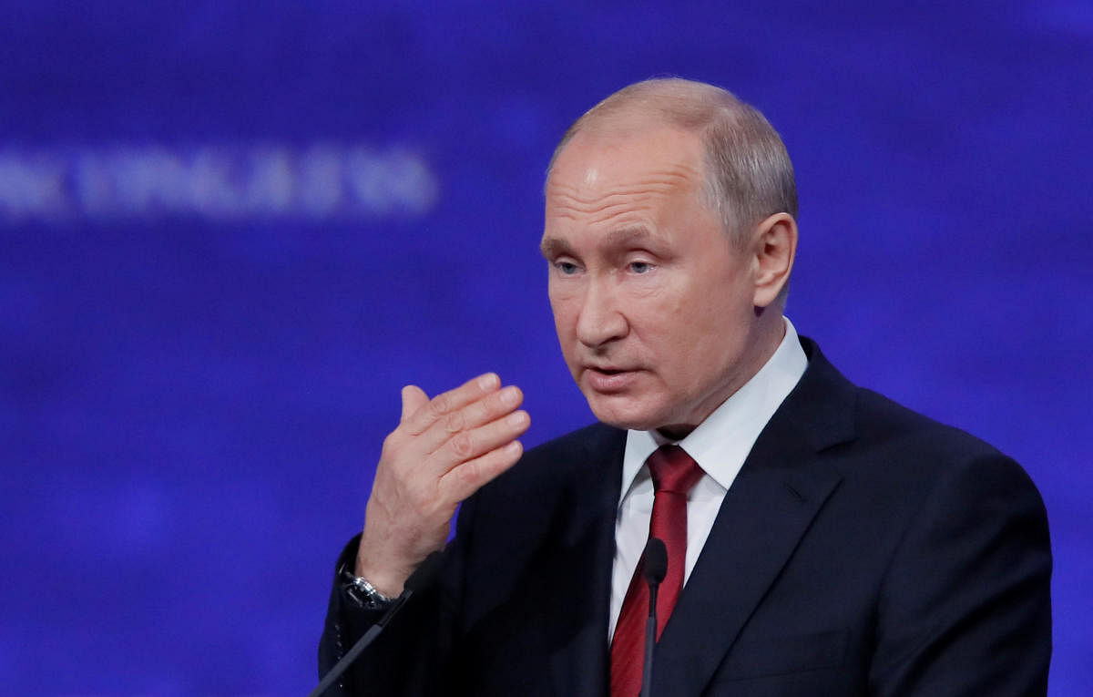 Speaking at an economic forum also attended by Chinese President Xi Jinping, Putin condemned "the situation around the company Huawei that they are attempting not just to squeeze but to unceremoniously push out of the global market." (Reuters Photo)