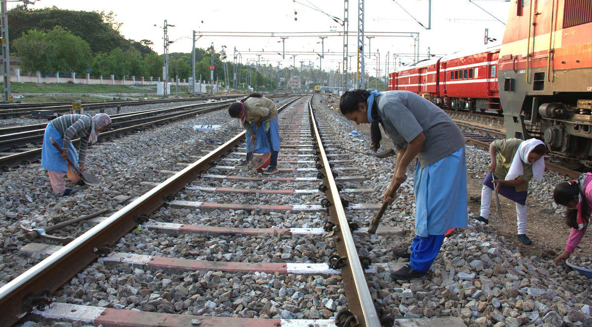 exceptional: Women personnel inspecting railway tracks and bogies in Mysuru. photos by author