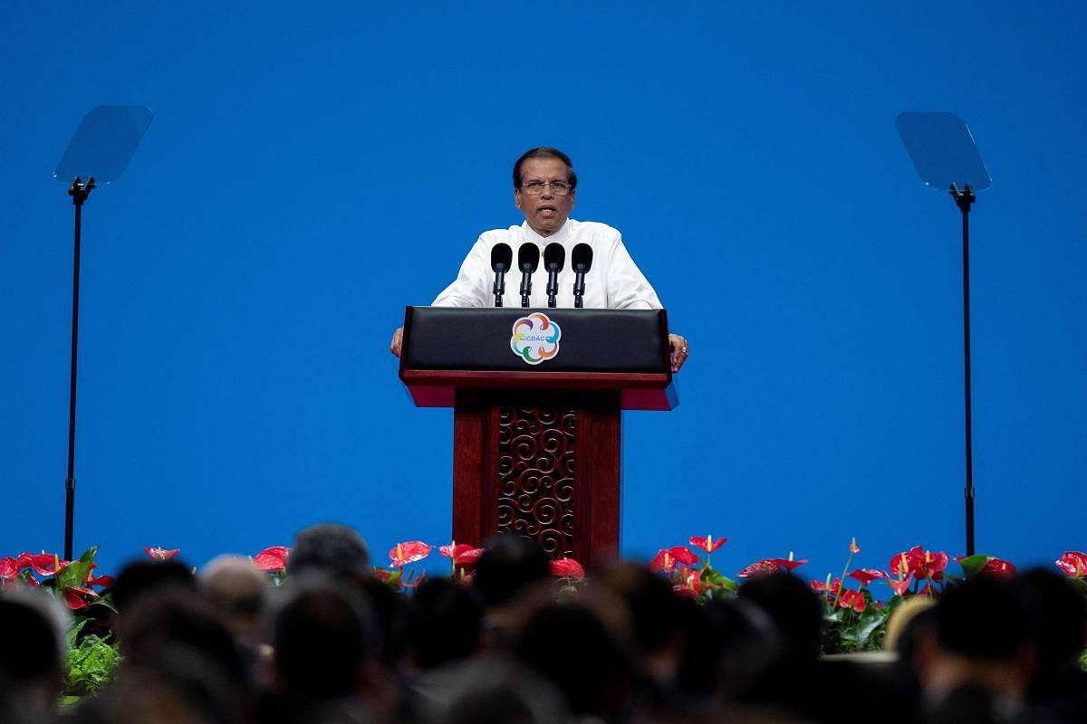 Maithripala Sirisena summoned an emergency meeting of his cabinet on Friday night to oppose the Parliamentary Select Committee (PSC) probing the April 21 attacks. (Photo by AFP)