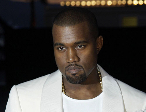 Rapper Kanye West has banned girlfriend Kim Kardashian from major surgeries like liposuction. AP photo