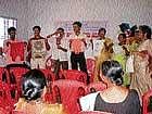 Students showing cloth bags as part of an awareness programme on Plastic-free Village at Naringana near Mangalore on Thursday.