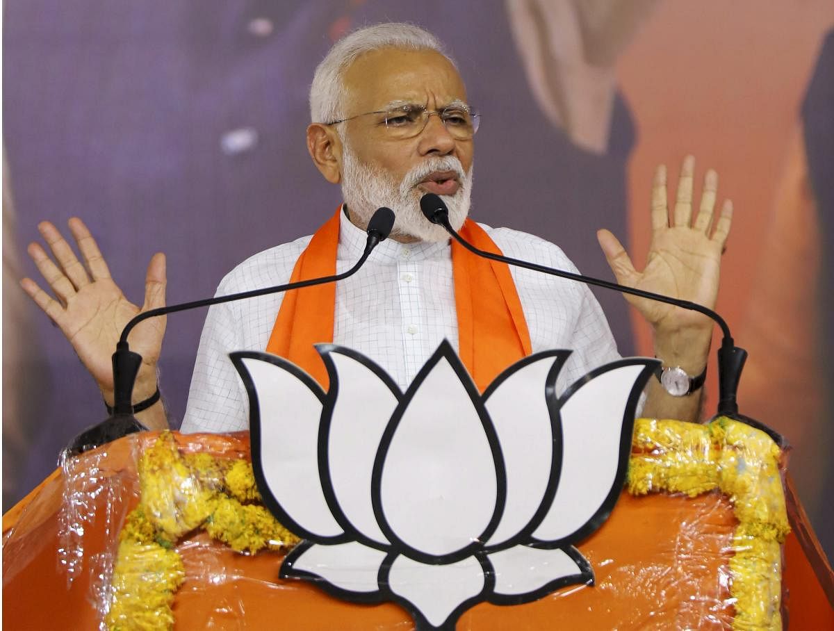 Prime Minister Narendra Modi addresses a public meeting at the BJP office in Ahmedabad on May 26, 2019 after the victory in the recent Lok Sabha elections/ PTI Photo