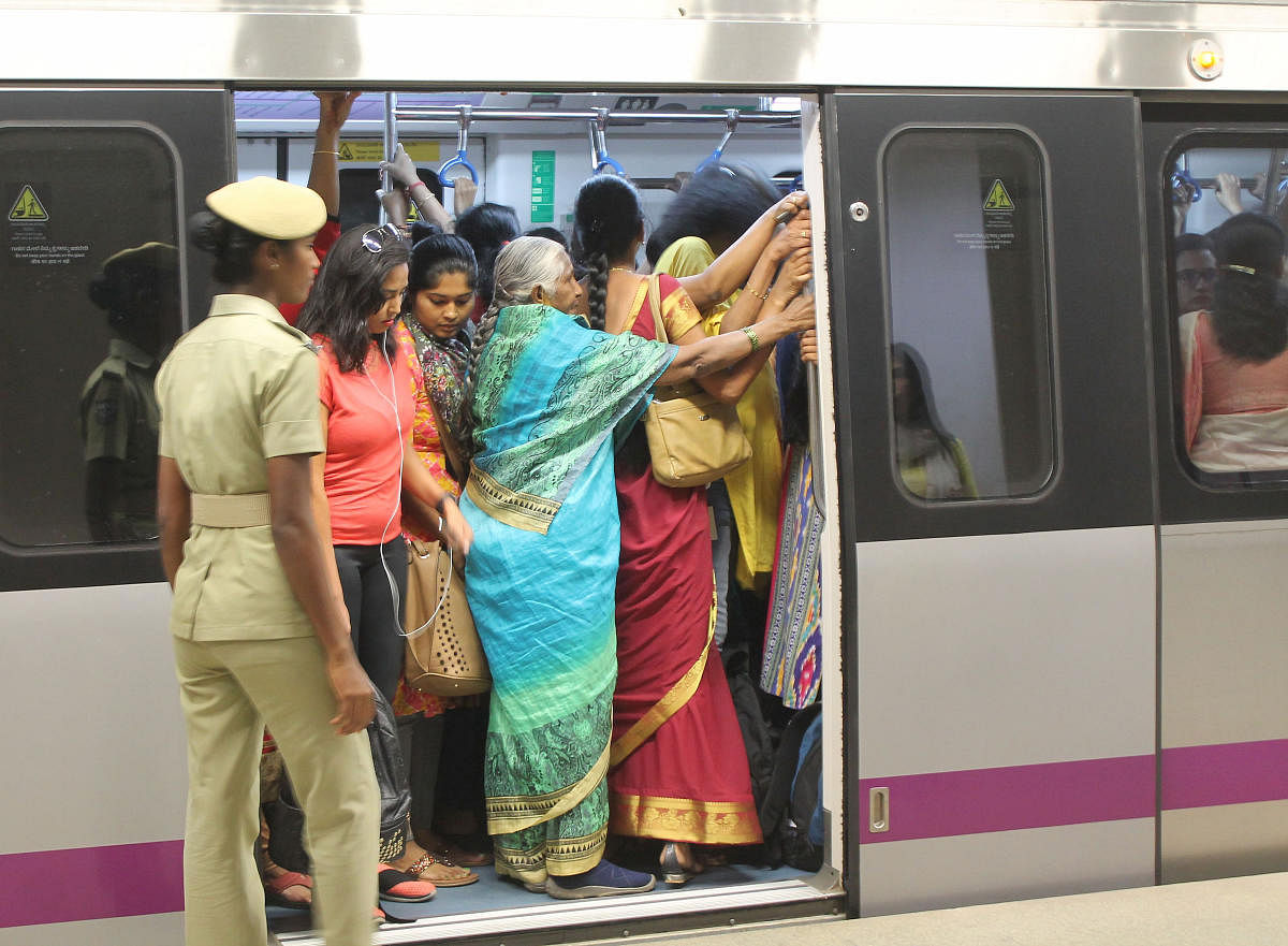 Activists and experts say that getting more women to use public transport could make the space safer. However, there is a need to increase the transport options available to them to reduce crowding and congestion. DH PHOTO BY SRIKANTA SHARMA R