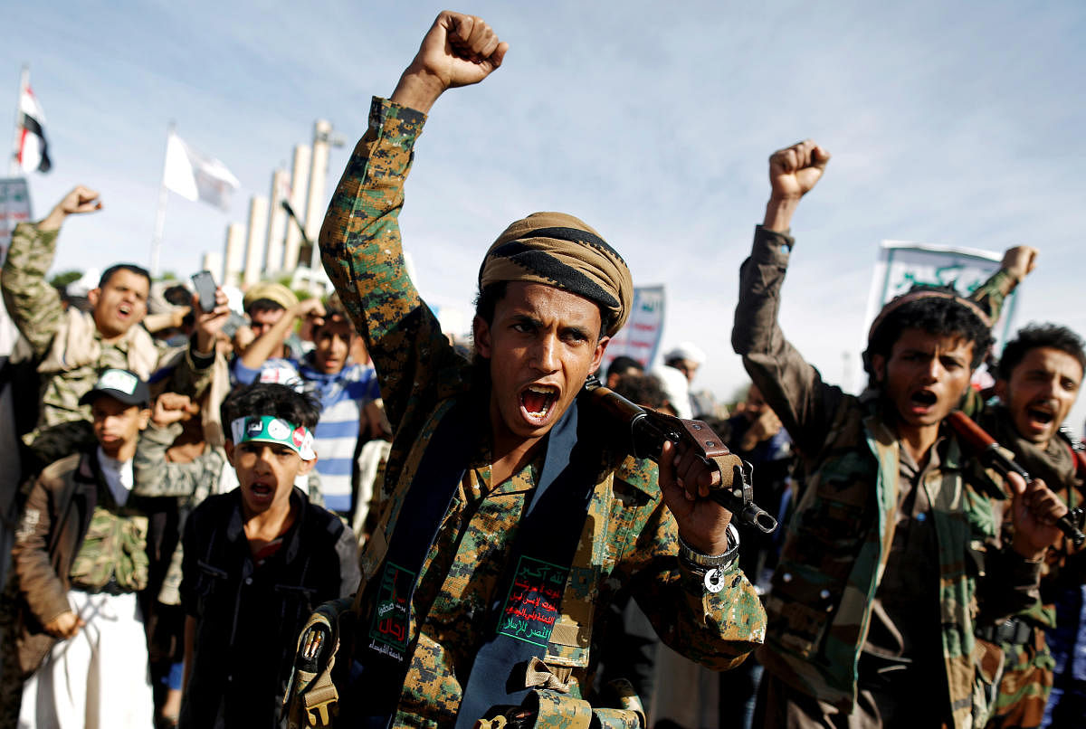 Supporters of the Houthi movement shout slogans as they attend a rally to mark the 4th anniversary of the Saudi-led military intervention in Yemen's war, in Sanaa, Yemen March 26, 2019. REUTERS/Khaled Abdullah/File Photo