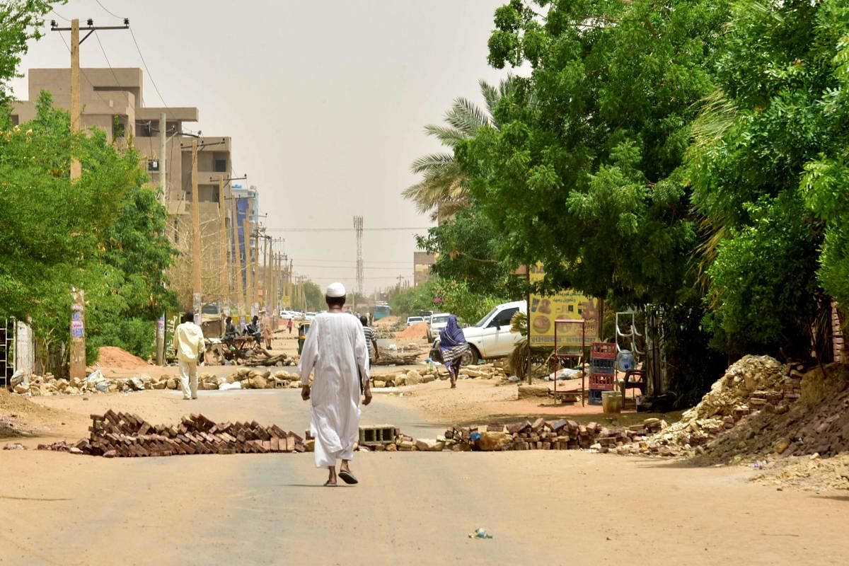On Sunday morning, the start of the working week in Sudan, few pedestrians or vehicles could be seen in the streets. (AFP Photo)