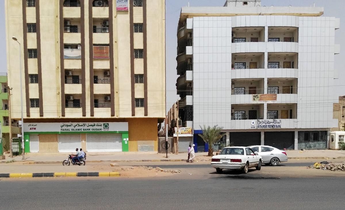 Closed banks in the Sudanese capital Khartoum on the second day of a nationwide civil disobedience campaign called to pressure the ruling military into handing over power. (AFP Photo)