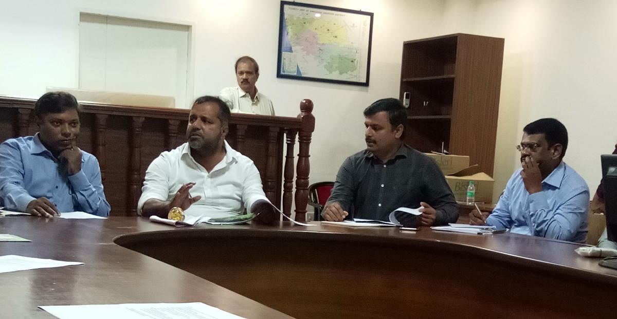 District In-charge Minister U T Khader speaks at a meeting on monsoon preparedness at the deputy commissioner’s office in Mangaluru on Monday.