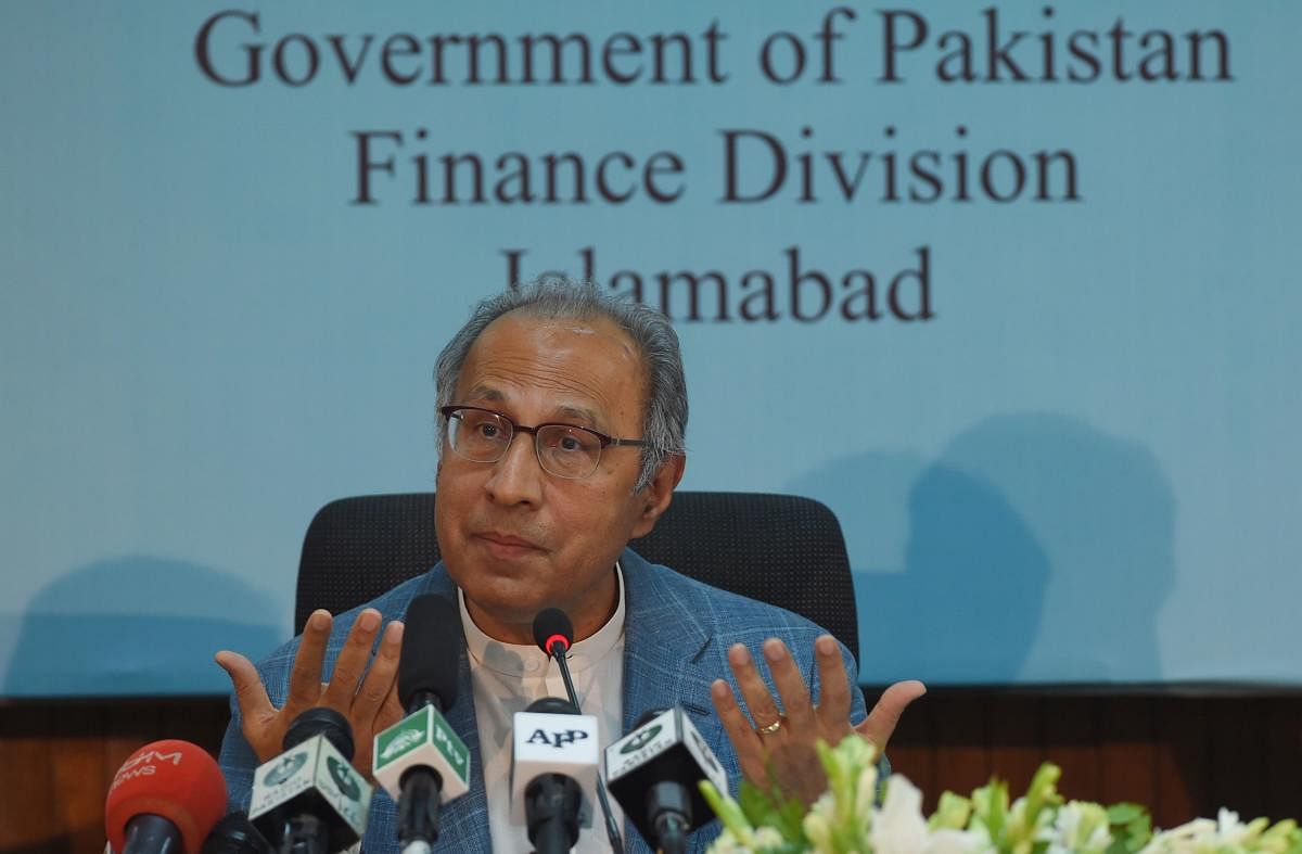 Advisor to Prime Minister Imran Khan on Finance, Revenue and Economic Affairs Abdul Hafeez Shaikh gestures during a pre-budget press conference in Islamabad. (AFP Photo)