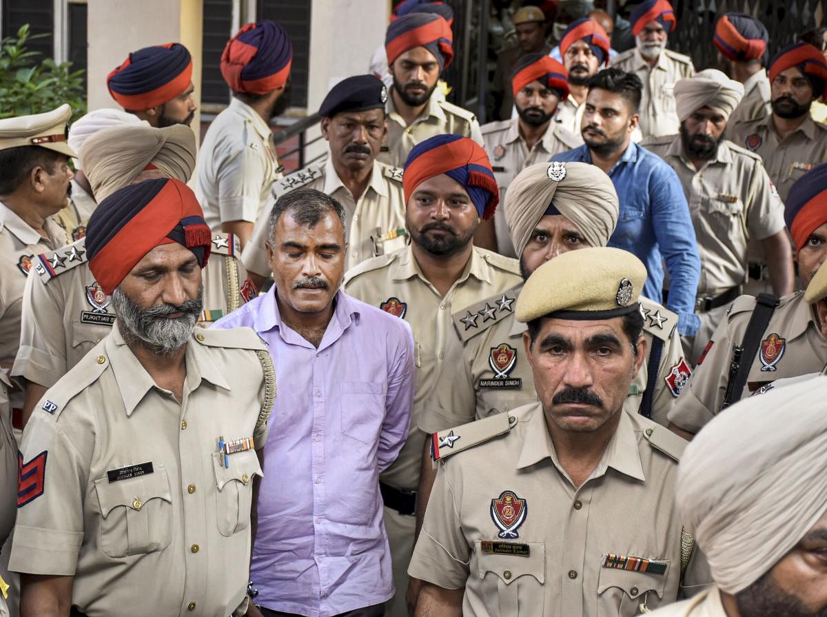 Pathankot: Kathua rape case convicts being taken to the District and Sessions Court for the pronouncement of the quantum of punishment in Pathankot, Punjab, Monday, June 10, 2019. The court awarded life term to three convicts and five years imprisonment t