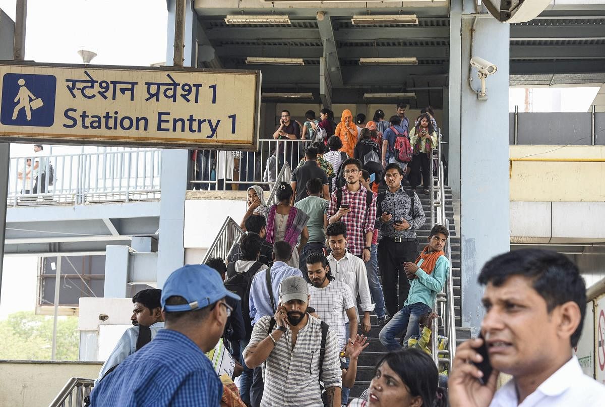 New Delhi: Passengers come out of the Chattarpur Metro Station  in New Delhi, Tuesday, May 21, 2019. 