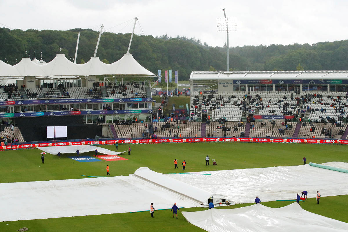 South Africa v West Indies - The Ageas Bowl, Southampton. Britain - June 10, 2019. General view of the covers over the pitch during a rain delay. Action Images via Reuters/Andrew Boyers