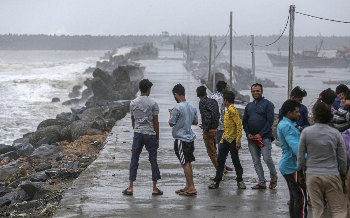 Strong winds and waves hit the shoreline ahead of the expected landfall of Cyclone Vayu, in Veraval, Thursday. PTI photo