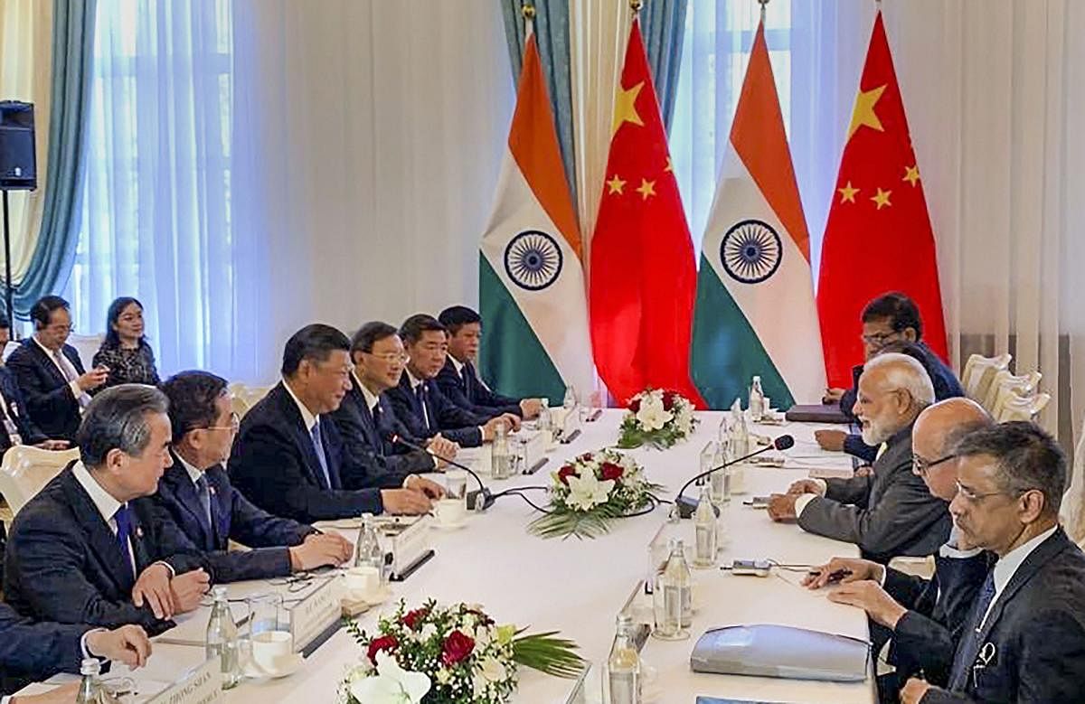 Prime Minister Narendra Modi meets Chinese President Xi Jinping on the sidelines of the Shanghai Cooperation Organisation (SCO) summit, in Bishkek, Kyrgyzstan, Thursday. PTI photo