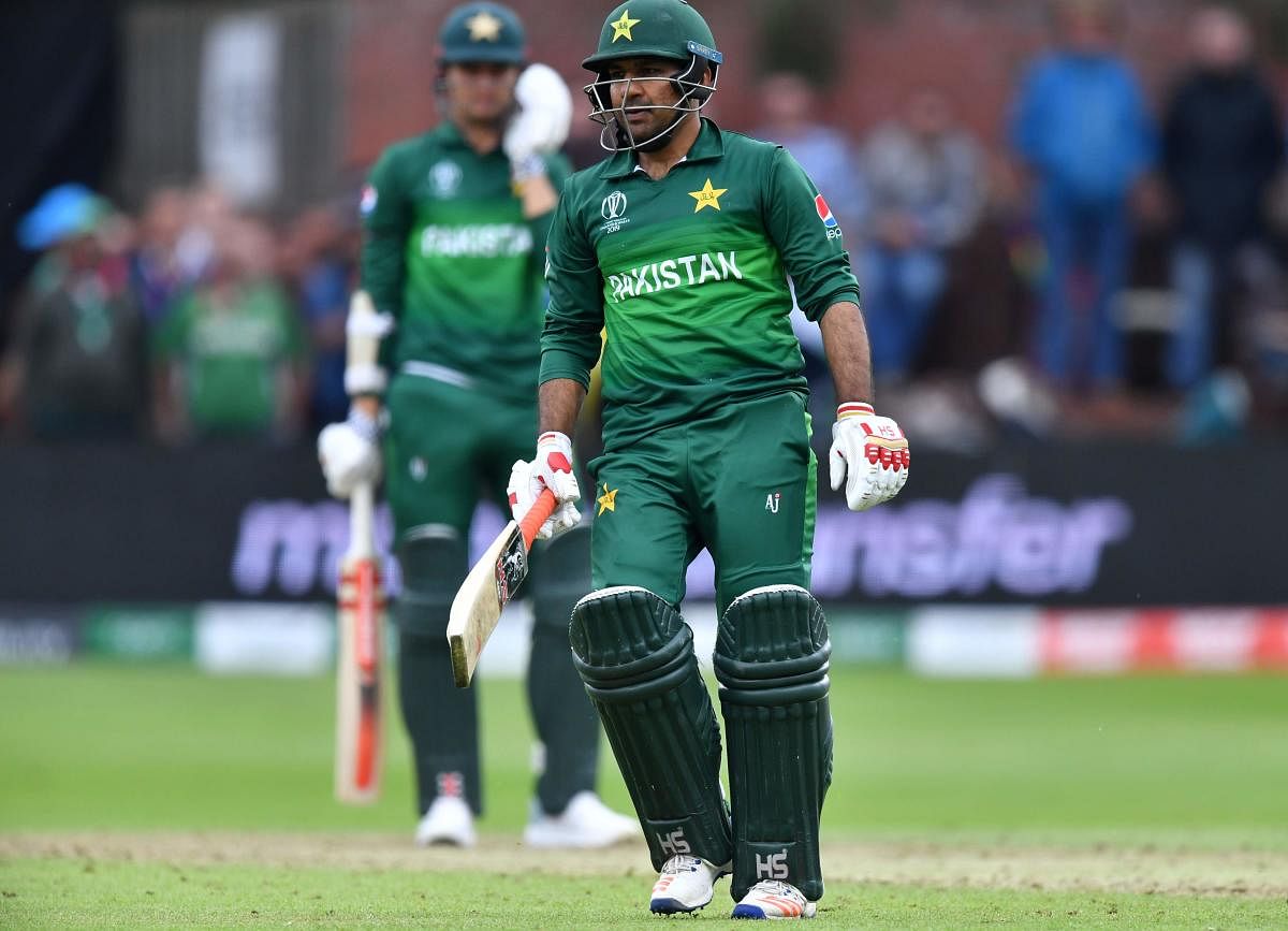 Pakistan's captain Sarfaraz Ahmed walks off the field after defeat in the 2019 Cricket World Cup group stage match between Australia and Pakistan at The County Ground in Taunton. AFP
