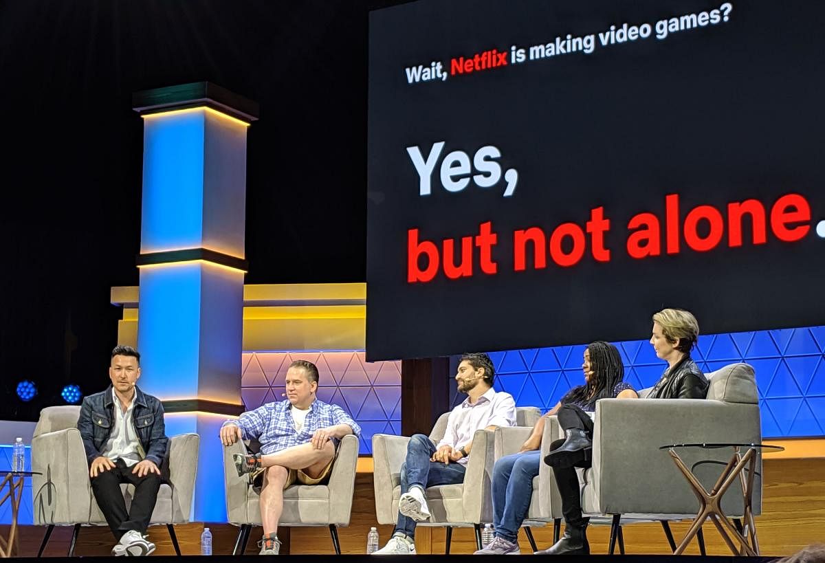 (FromL) Netflix director of interactive gaming Chris Lee, BonusXP game studio president Dave Pottinger, "Stranger Things" writer Paul Dichter and Henson Company director of digital and interactive media Stephanie Wise discuss Netflix's plans to make video