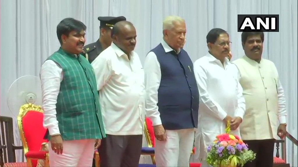 In the much-awaited expansion, R Shankar and H Nagesh were sworn in as cabinet-rank ministers by Governor Vajubhai Vala who administered them the oath of office and secrecy at a ceremony at the Raj Bhavan. (Image courtesy ANI/Twitter)