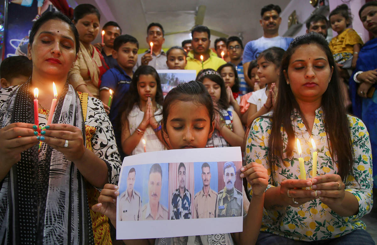 Students and teachers of a dancing institute pay tributes to CRPF jawans who were killed in Anantnag's 'Fidayeen' attack, in Jammu, Friday, June 14, 2019. (PTI Photo)