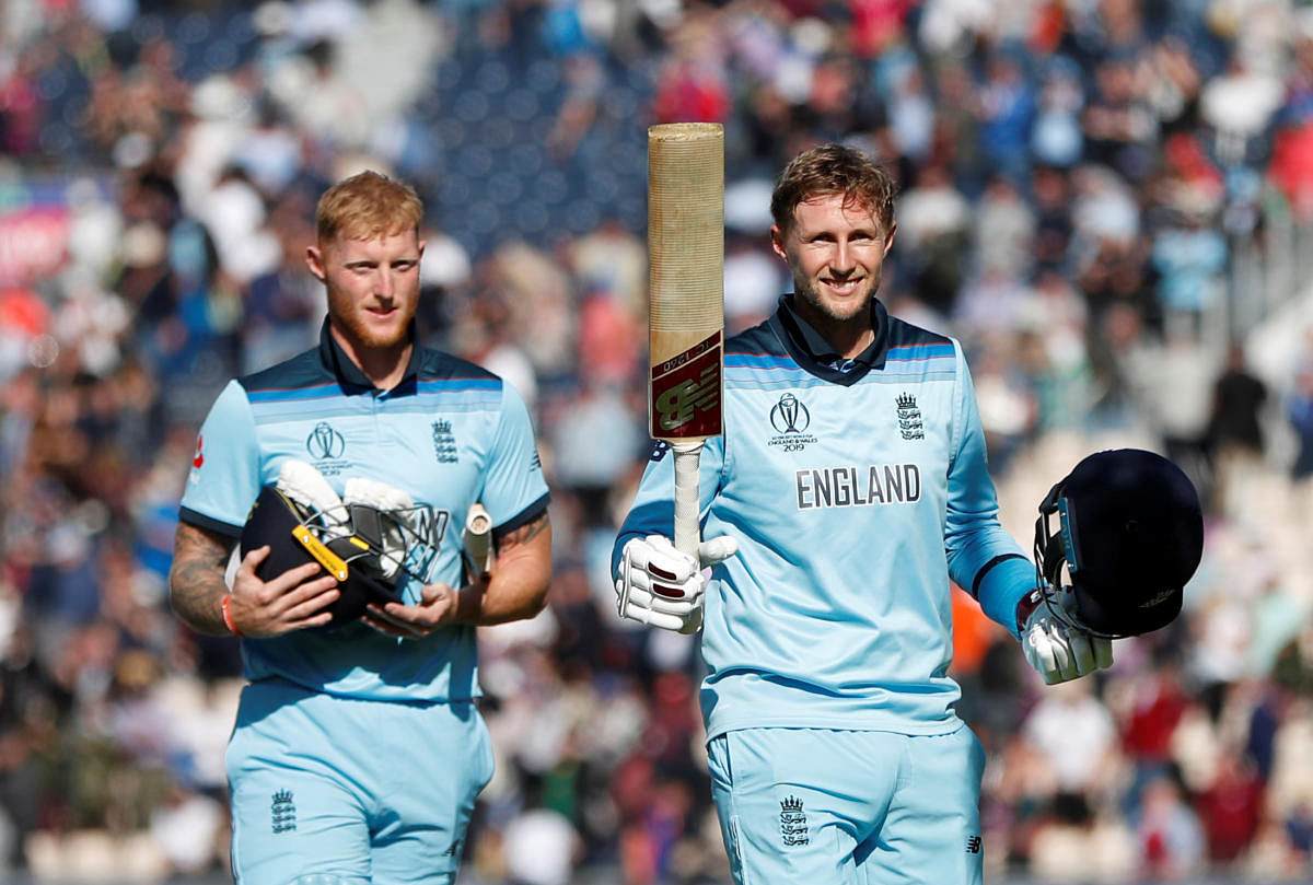 England's Joe Root and Ben Stokes celebrate after winning the match. Reuters