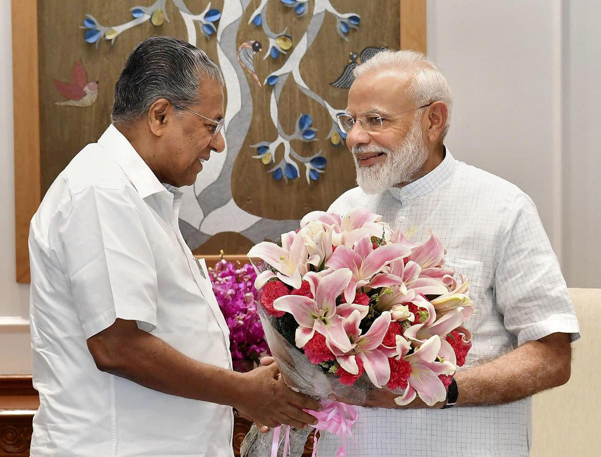 Prime Minister Narendra Modi with Chief Minister of Kerala Pinarayi Vijayan during a meeting, New Delhi, Saturday, June 15, 2019. (PTI Photo)