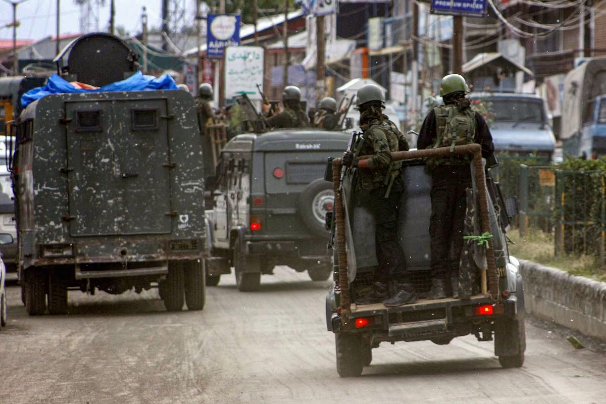 Security personnel near the site of 'Fidayeen' attack, in which five CRPF personnel and one militant were killed and four others including an SHO were injured, in Anantnag on Wednesday, June 12, 2019. (PTI file photo)