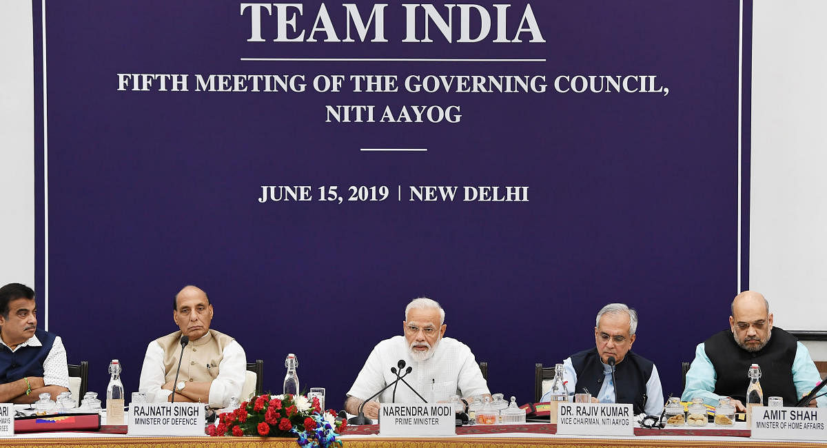 New Delhi: Prime Minister Narendra Modi chairs the fifth meeting of the Governing Council of NITI Aayog, in New Delhi, Saturday, June 15, 2019. Also seen are Union Ministers Nitin Gadkari, Rajnath Singh, Amit Shah and NITI Aayog Vice-Chairperson Rajiv Kumar. PIB/PTI