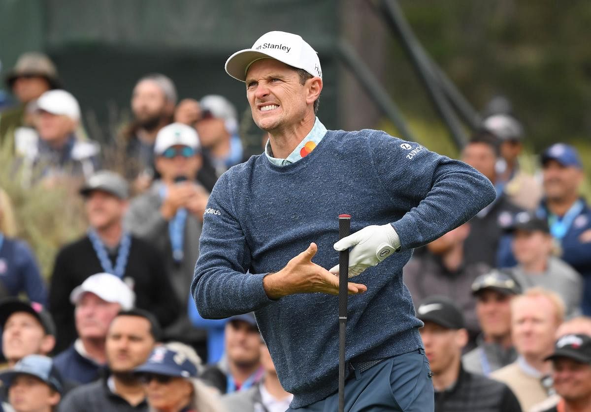CLOSING IN: Justin Rose of England reacts to his shot during the third round of the 2019 U S  Open on Saturday. AFP