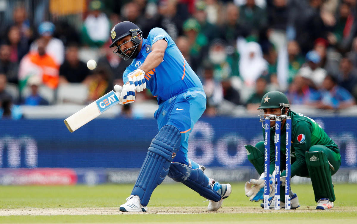 HIT-MAN: India’s Rohit Sharma smacks one to the boundary during his match-wining innings of 140 against Pakistan at Old Trafford on Sunday. Reuters