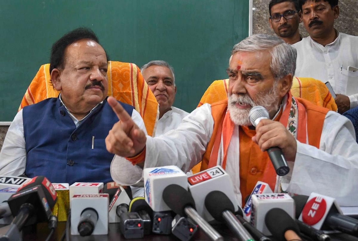 Union MoS for Health Ashwini Kumar Choubey addresses a press conference as Union Health Minister Harsh Vardhan looks on, after their visit at Shri Krishna Medical College and hospital (SKMCH) to review the situation prevailing due to Acute Encephalitis Syndrome (AES) in Muzaffarpur, Sunday, June 16, 2019. (PTI Photo)