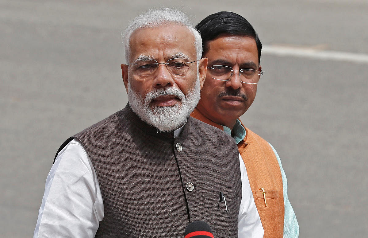 Ahead of the maiden budget of his second term in office, Prime Minister Narendra Modi Tuesday brainstormed with top bureaucrats of finance and other ministries for ideas to reverse a slagging economy and create jobs. (REUTERS Photo)