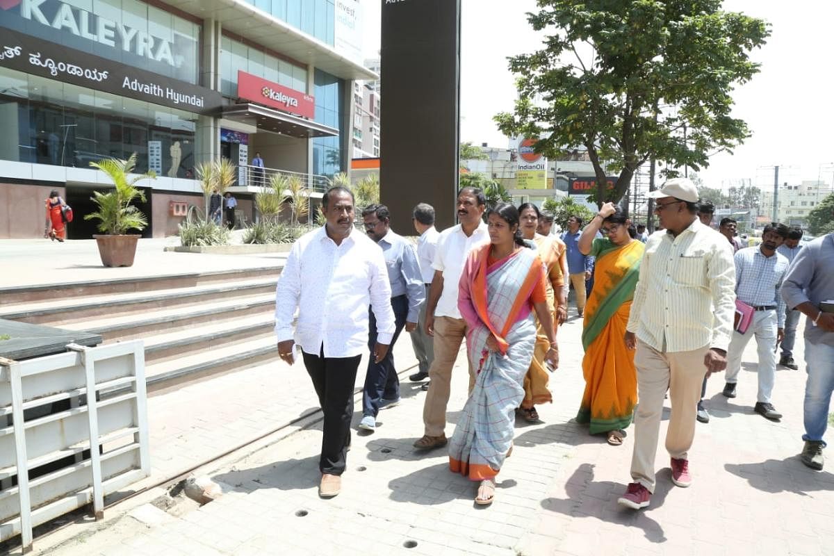 Mayor Gangambike Mallikarjun inspects the ongoing road widening work at Bannerghatta Road. Special arrangement