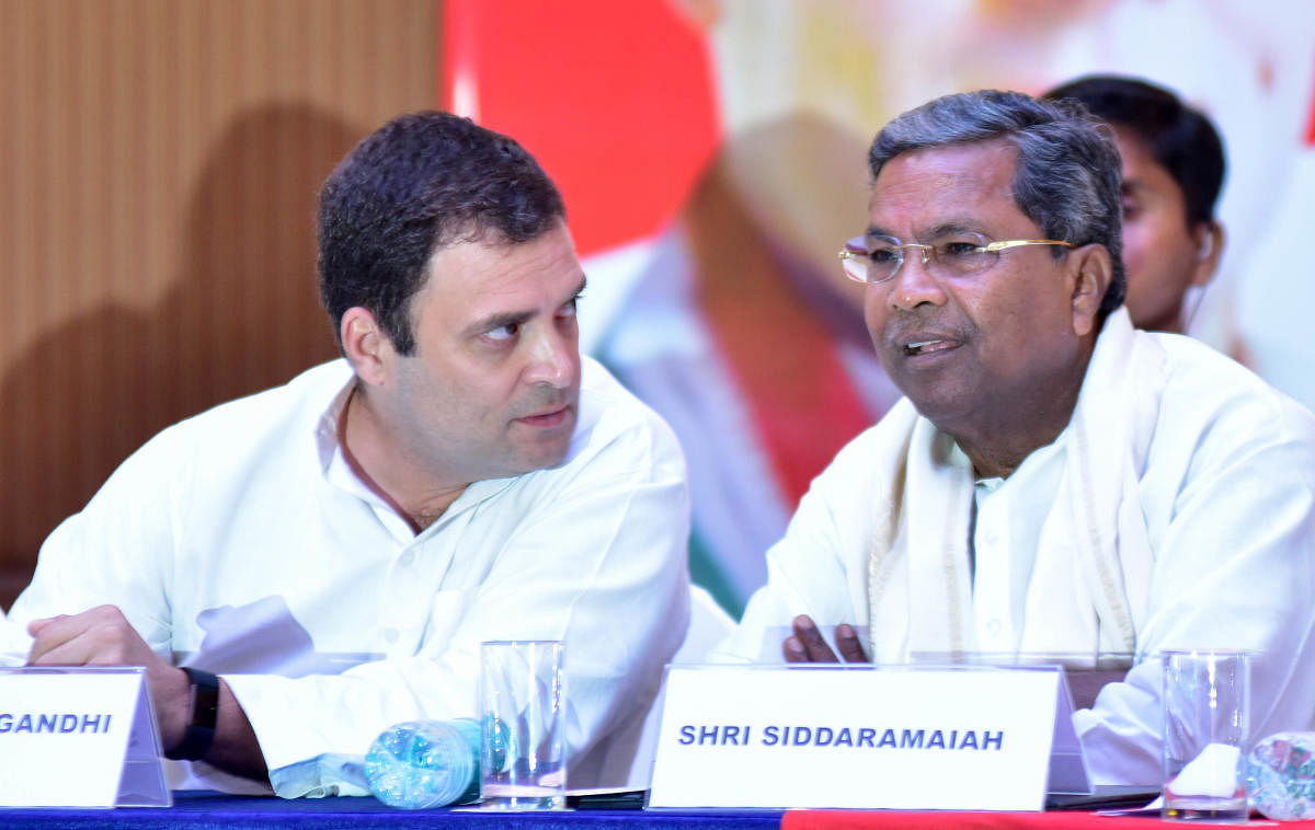 AICC President Rahul Gandhi seen with Chief Minister Siddaramaiah,during the special press conference, at Lalit Ashok Bengaluru on 10th May 2018. Photo/ B H Shivakumar