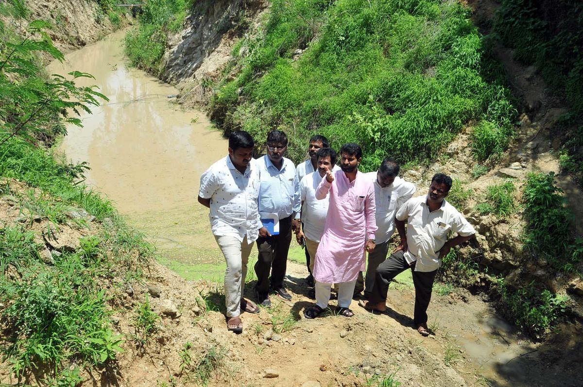 MLA C T Ravi inspecting the canal of Karagada project in Chikkamagaluru.