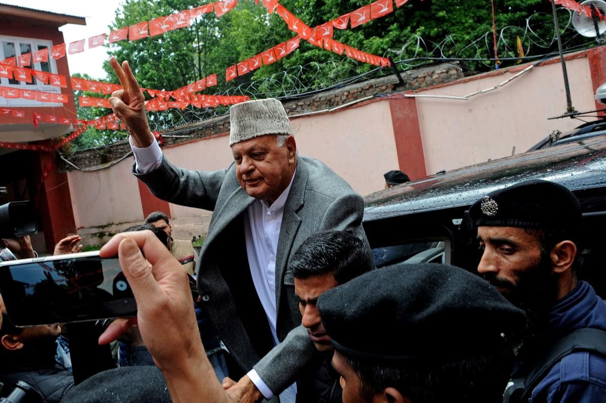 National Conference (NC) leader Farooq Abdullah (C), former chief minister of Jammu and Kashmir. (AFP Photo)
