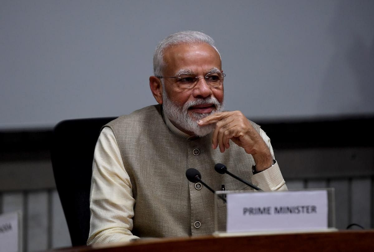 Prime Minister Narendra Modi on Thursday joined a host of cricketers to offer his sympathy to injured India opener Shikhar Dhawan, saying "the pitch will miss you." (AFP Photo)