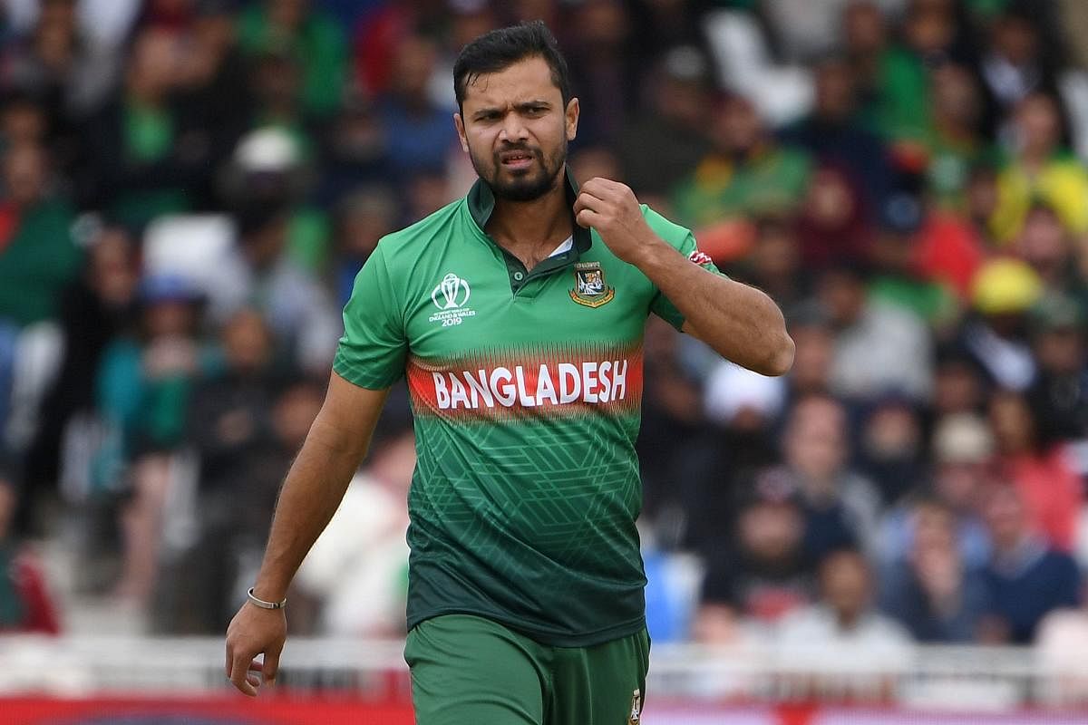 Bangladesh's captain Mashrafe Mortaza reacts during the 2019 Cricket World Cup group stage match between Australia and Bangladesh at Trent Bridge in Nottingham, central England, on June 20, 2019. (AFP)