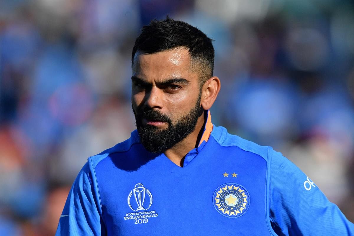 India's captain Virat Kohli looks on after victory in the 2019 Cricket World Cup group stage match between India and Afghanistan at the Rose Bowl in Southampton, southern England. AFP photo