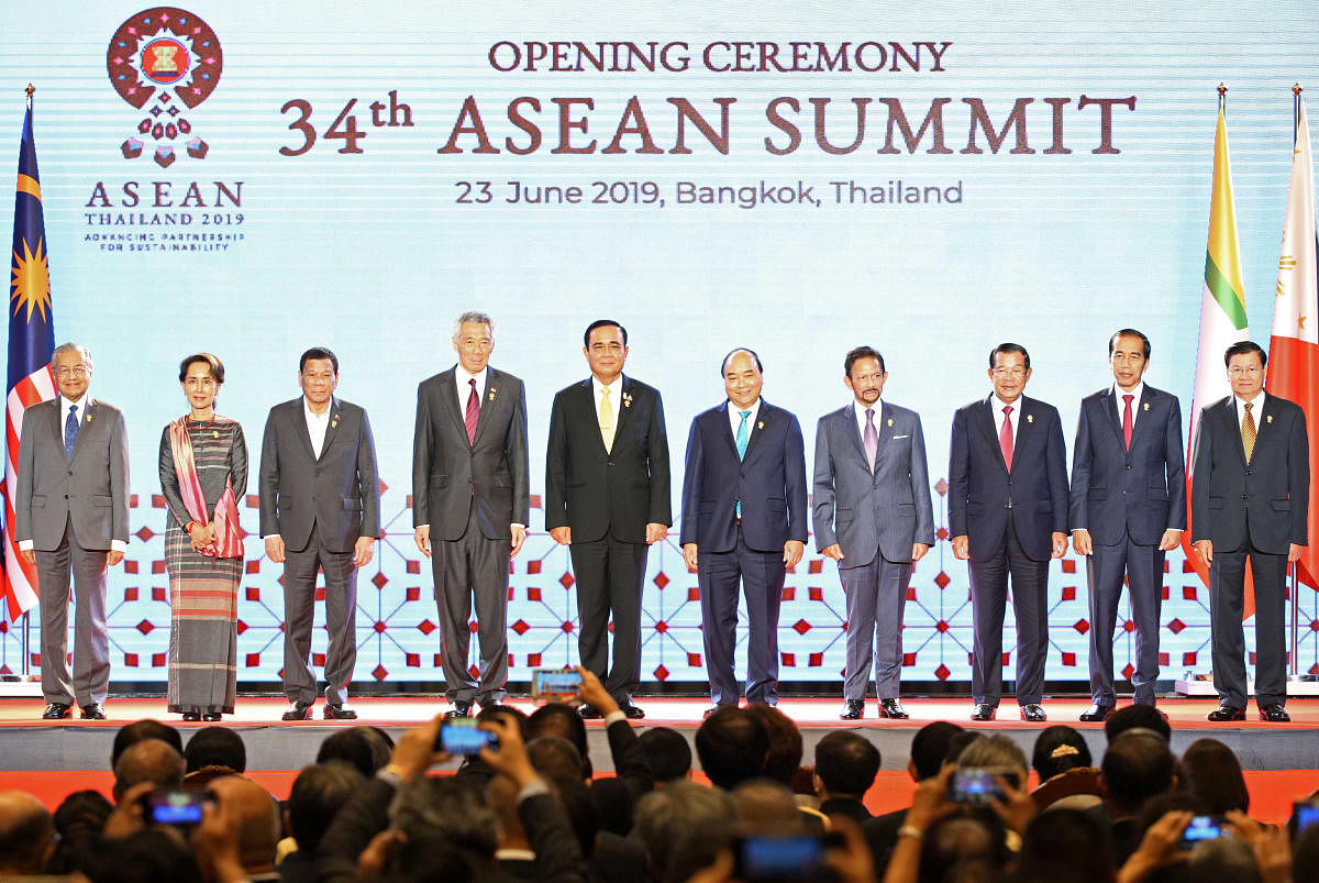 ASEAN leaders pose on stage during the opening ceremony of the 34th ASEAN Summit at the Athenee Hotel in Bangkok, Thailand. (Reuters Photo)