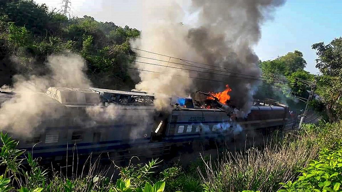 Rayagada: Smoke rises from a burning compartment of 18005 Howrah- Jagdalpur Samaleswari Express that got derailed, in Rayagada, Tuesday, June 25, 2019. (PTI Photo) 