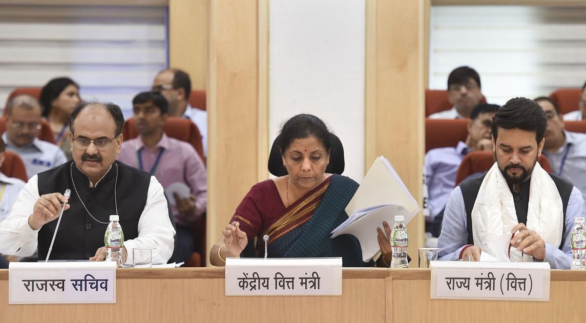 Union Finance Minister Nirmala Sitharaman with Revenue Secretary Ajay Bhushan and Minister of State for Finance and Corporate Affairs Anurag Singh Thakur, during the 35th Goods and Service Tax (GST) council meeting, in New Delhi, Friday, June 21, 2019. (Photo by PTI)