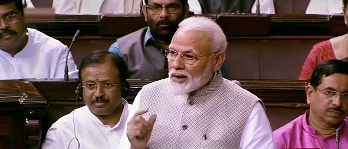 Prime Minister Narendra Modi speaks in the Rajya Sabha during the 'Motion of Thanks on President's Address', at Parliament in New Delhi (PTI Photo)
