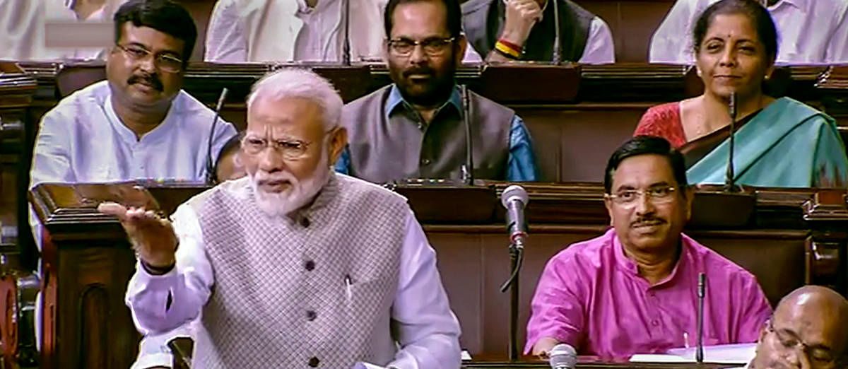 Prime Minister Narendra Modi speaks in the Rajya Sabha during the 'Motion of Thanks on President's Address', at Parliament in New Delhi on Wednesday. PTI photo