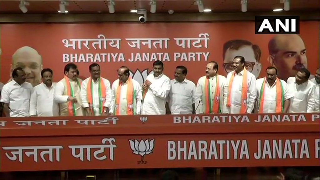 Former ministers in undivided Andhra Pradesh -- E Peddi Reddy and Boda Janardhan-- and former MP Suresh Reddy are some of the Telugu Desam Party (TDP) leaders who joined the BJP at its headquarters here. (Image courtesy ANI/Twitter)