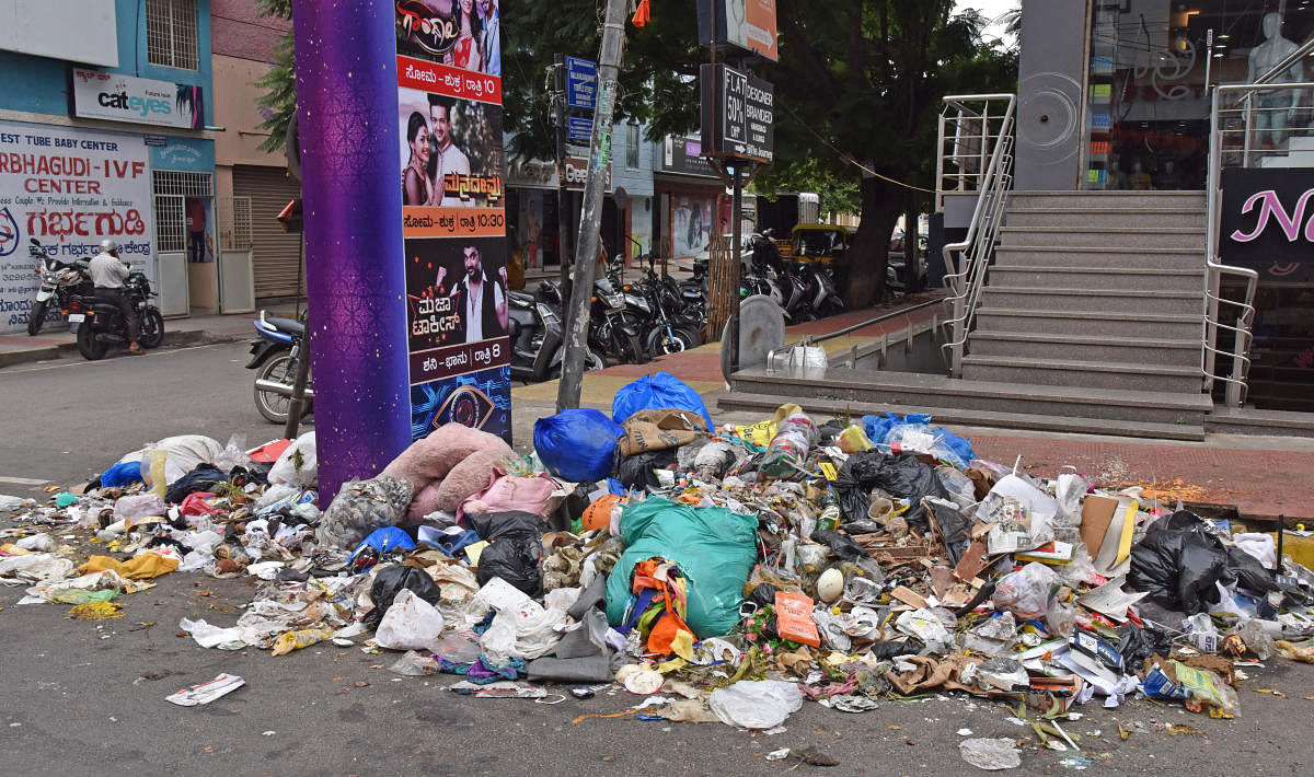  Trash lies uncollected at Basavanagudi during an earlier strike by the contractors. DH file photo/S K Dinesh