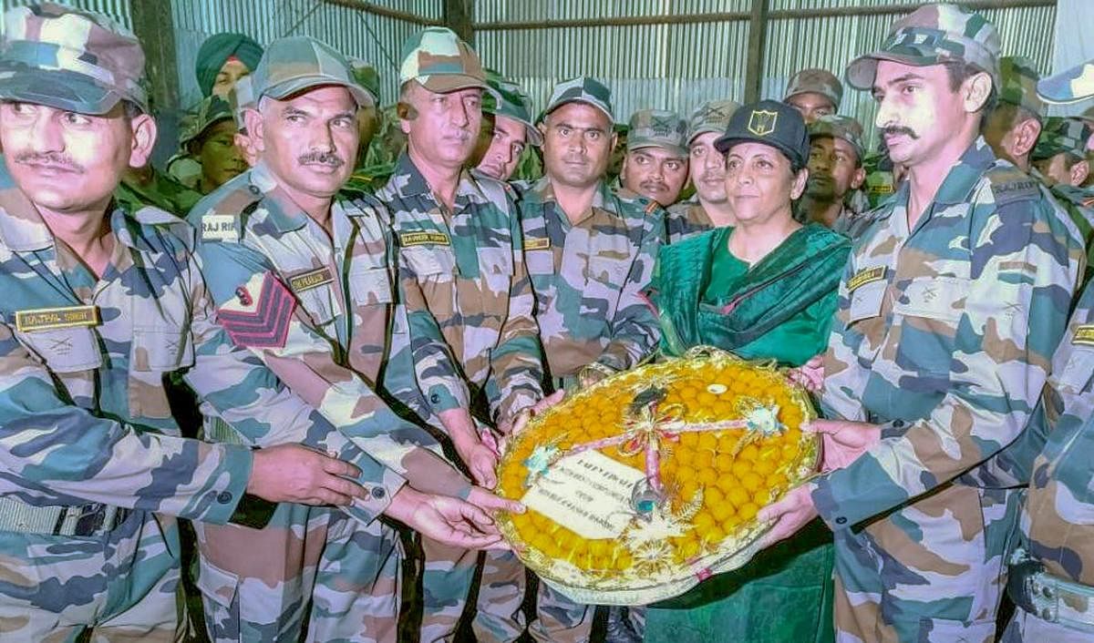 efence Minister Nirmala Sitharaman celebrating Diwali with the Indian troops deployed in the forward posts of Upper Dibang in Arunachal Pradesh on Wednesday. PTI Photo