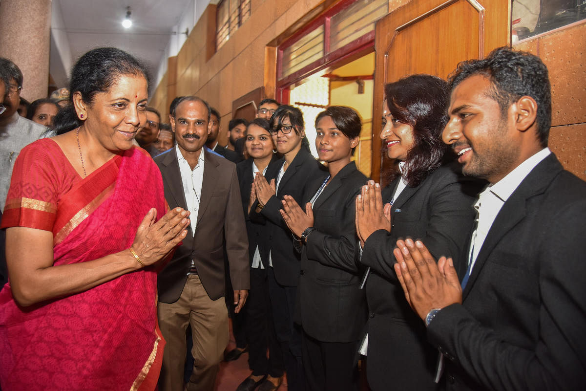 Defence Minister Nirmala Sitharaman arrives for a public interaction in Bengaluru on Sunday. DH Photo/S K Dinesh
