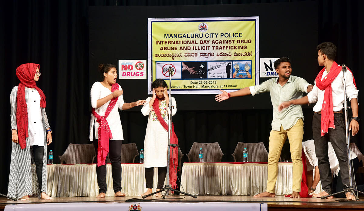 Students of the School of Social Work Roshni Nilaya present a skit highlighting the ill-effects of drug consumption on the occasion of International Day against Drug Abuse and Illicit Trafficking organised by the Mangaluru City Police in Mangaluru on Wedn